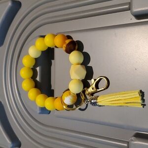 Wristlet made with silicone beads has lobster clasp